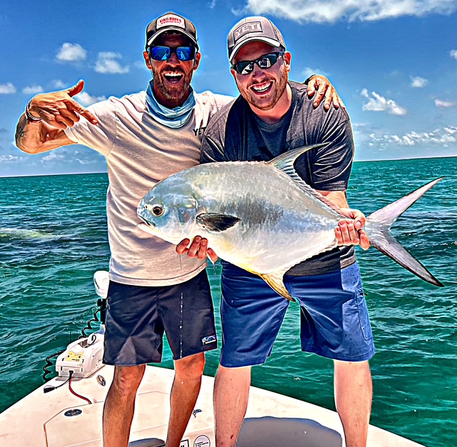 Captain and guest with a big permit off Key West