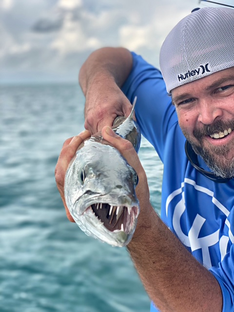 Close view of a toothy fish held aboard a Key West charter
