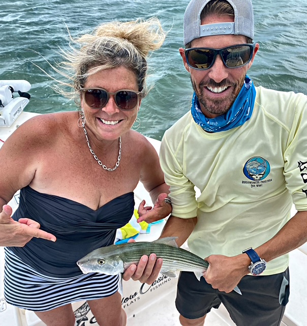 Guest and captain with a bonefish on a Key West flats charter