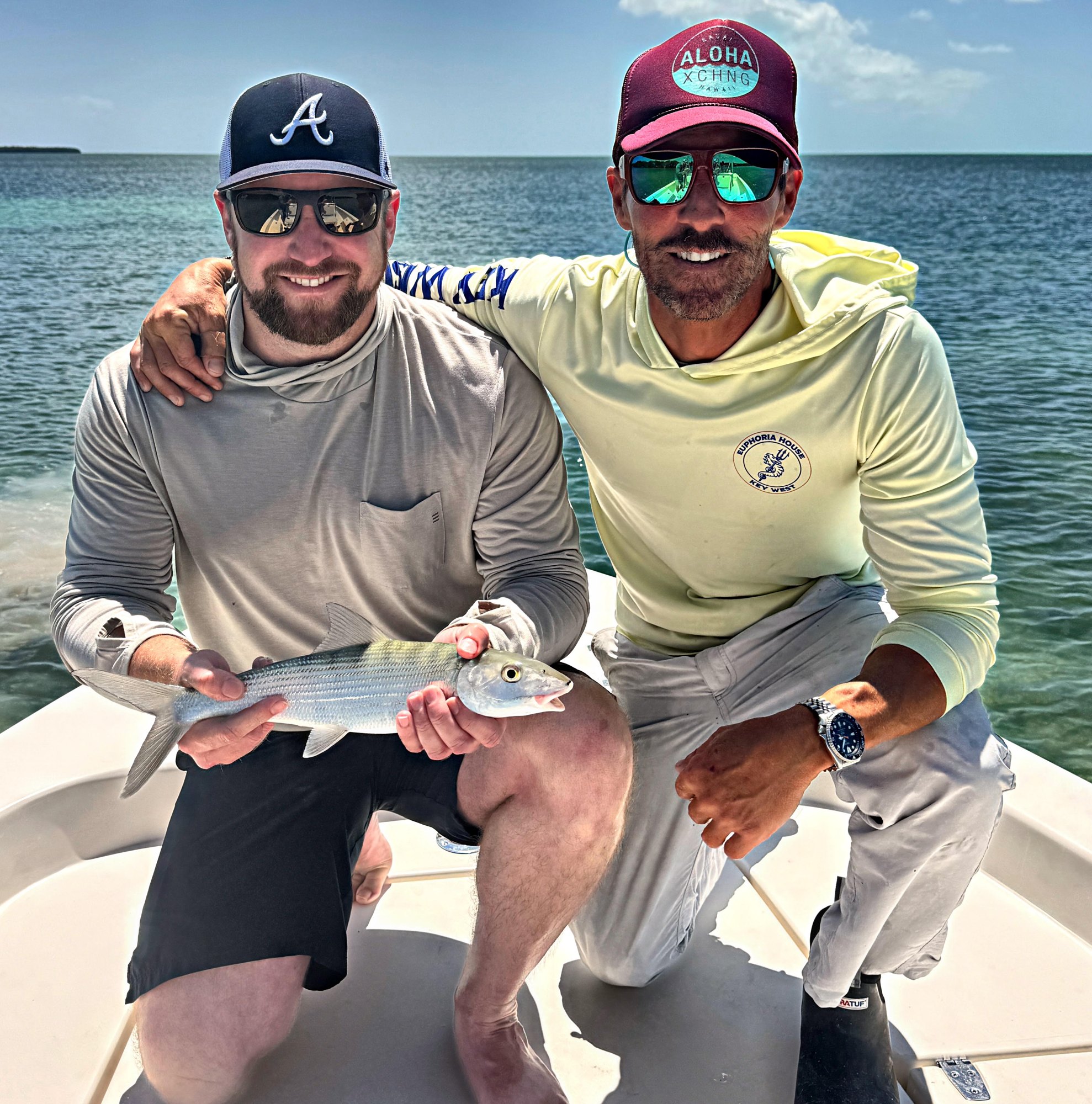Two anglers with a bonefish before release on the Key West flats