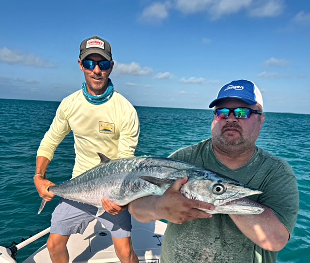 Two anglers with a kingfish off Key West